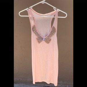 Lush pale pink tank top with beaded bow